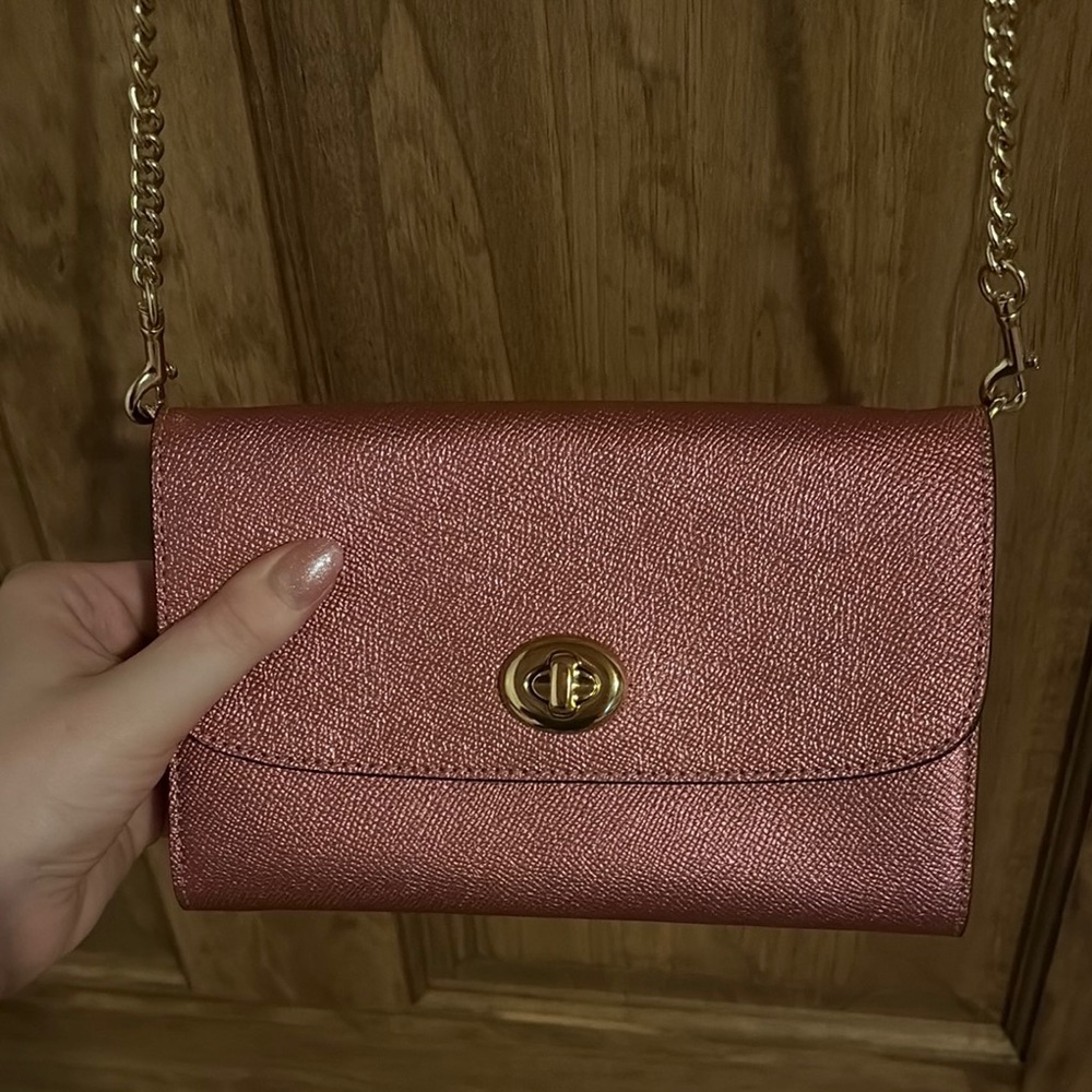 Coach Pink Clutch with Chain Strap and Turn-Lock Closure